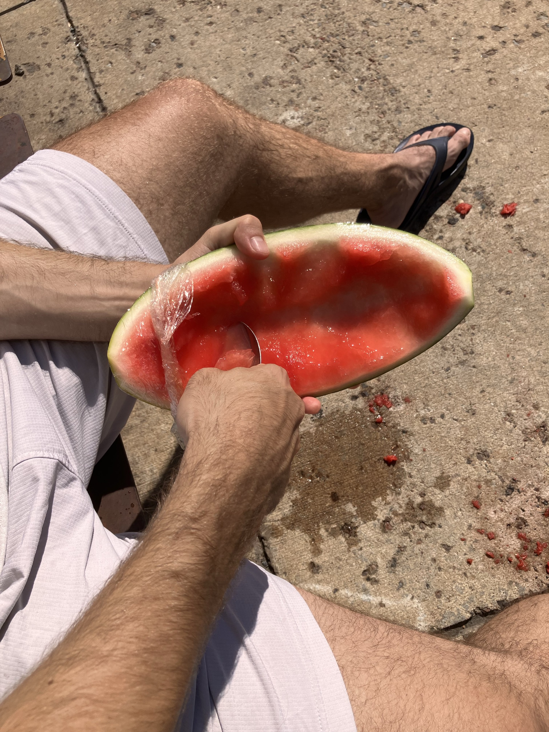 Eating watermelon outdoors in the sun